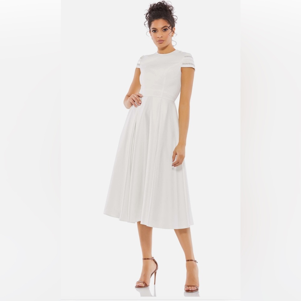 HIGH NECK CAP SLEEVE TEA LENGTH DRESS by Ieena for Mac Duggal